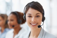 a woman wearing a headset in a call center